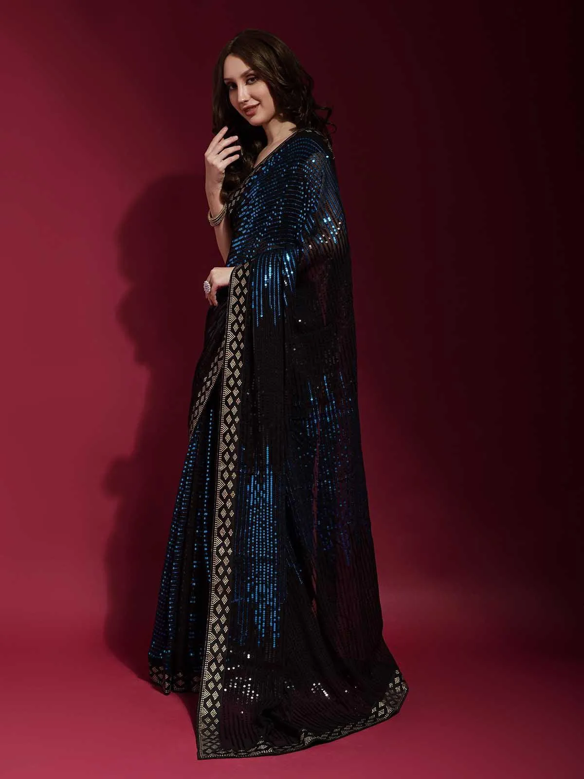 Odette Women Black And Blue Georgette Sequence Saree With Unstitched Blouse