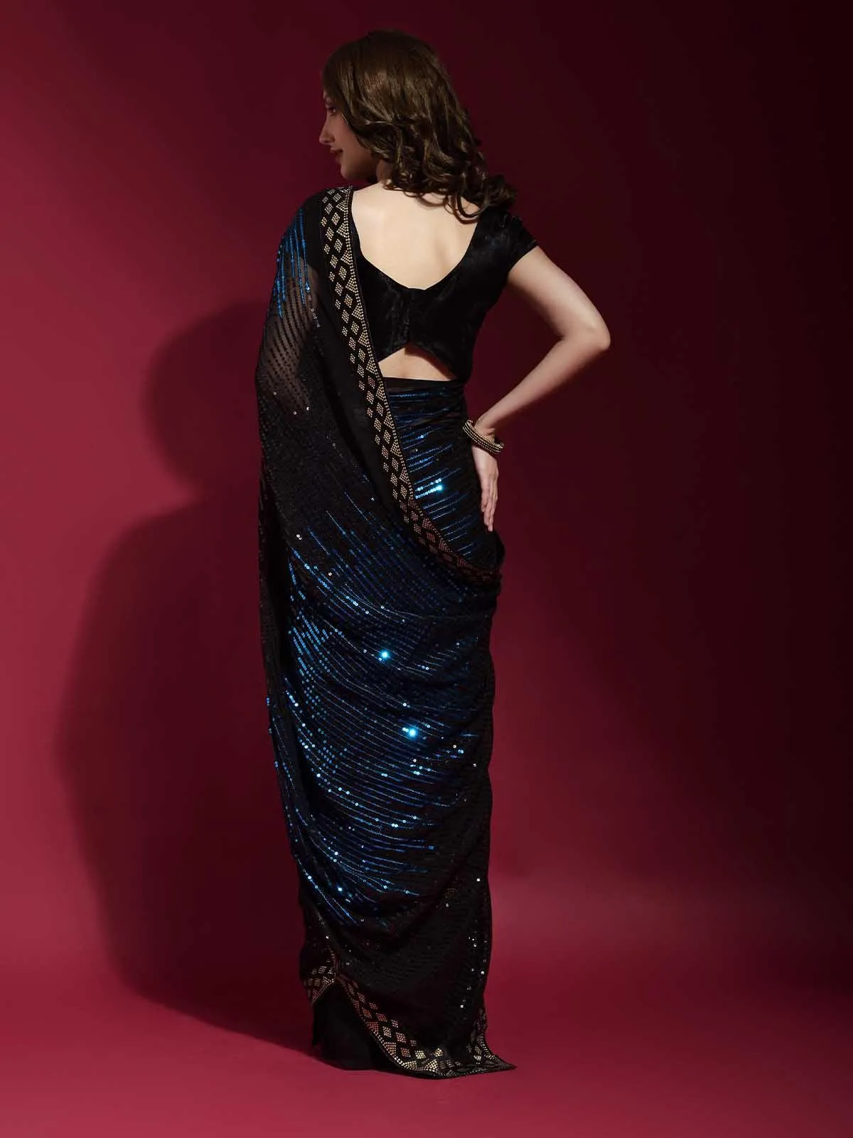 Odette Women Black And Blue Georgette Sequence Saree With Unstitched Blouse