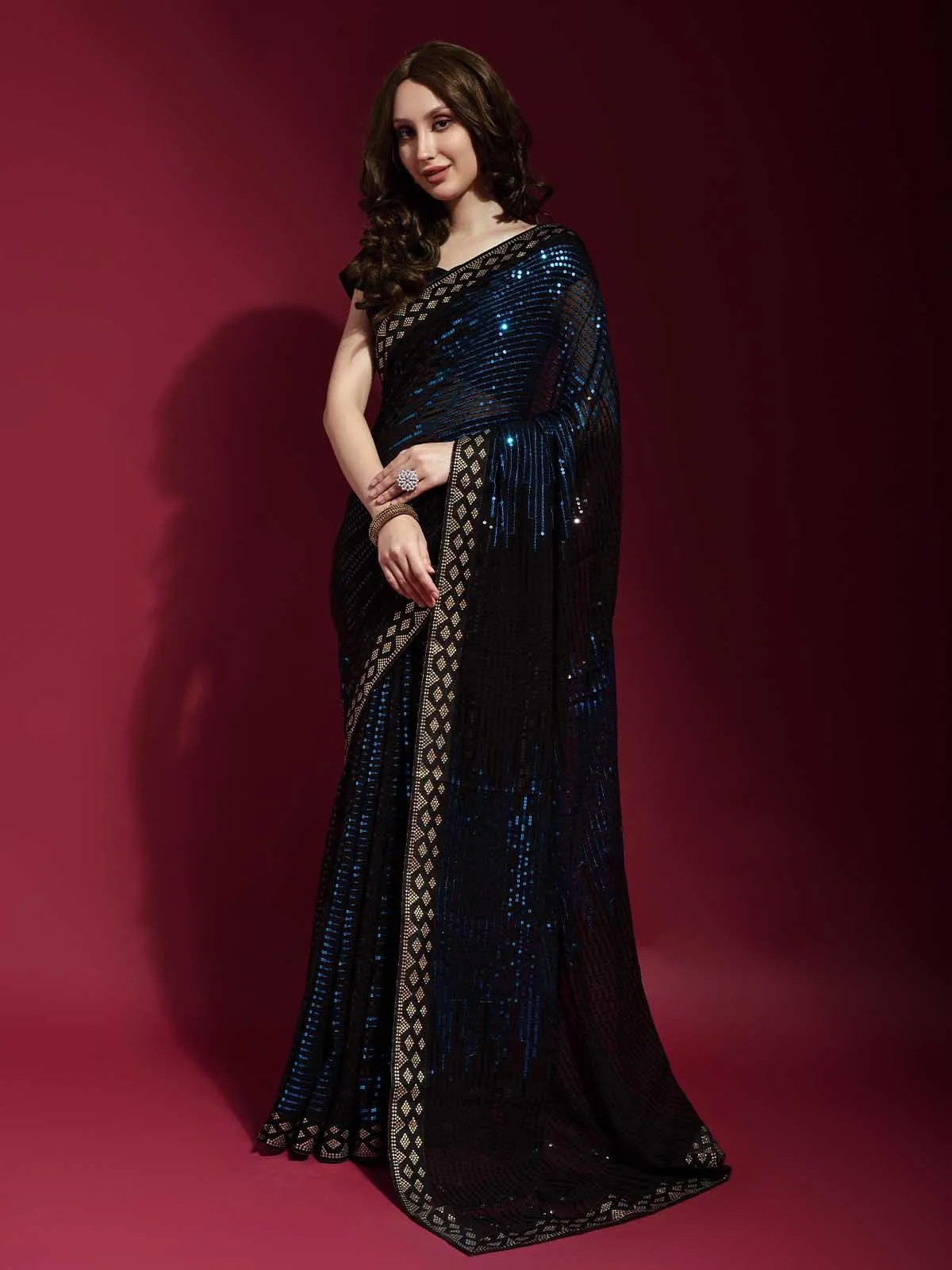 Odette Women Black And Blue Georgette Sequence Saree With Unstitched Blouse